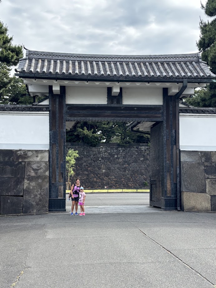 Mom and oldest kid in front of Imperial Palace gate